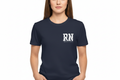 Woman wearing navy t-shirt with only RN design on left chest